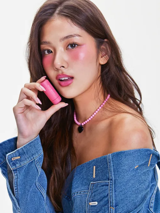 Beauty model shoot: pink blush, a denim jacket and a pink pearl choker