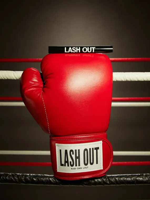 Cosmetic product photography: Lash Out mascara on the boxing glove