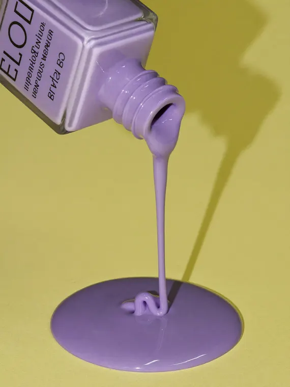 Cosmetic product photography: nail polish pouring drips