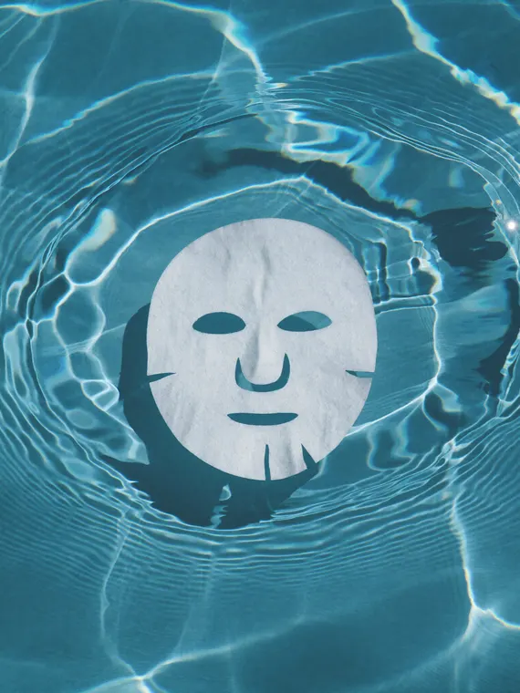 Cosmetic product photography: sheet mask floating in water