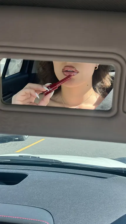 Beauty AI UGC reel: lip combo, car mirror