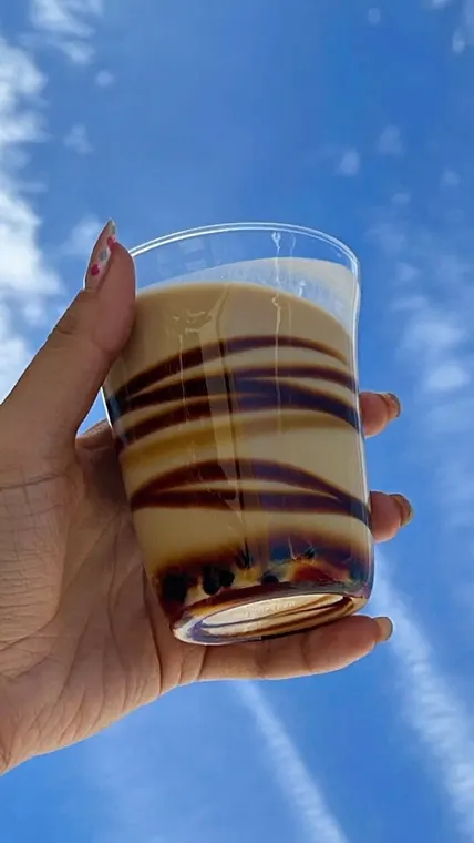 Food AI UGC reel: boba held up to the sky