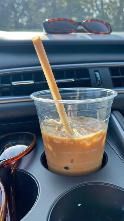 Food AI UGC reel: iced coffee, car cup holder