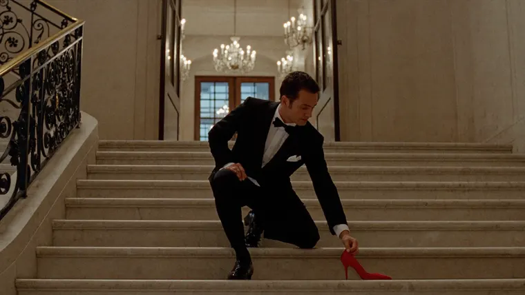 Shoe commercial Midnight Stairs, scene 3: he picks it up