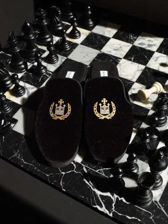 Shoe product photography: velvet slippers on the chessboard