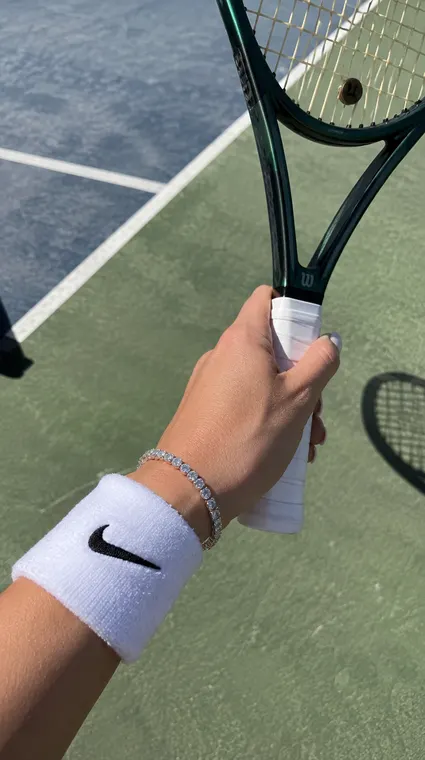 Jewellery AI UGC reel: tennis bracelet on the racket grip