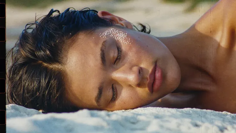 Perfume ad film Low Tide, scene 5: cheek on warm rock, salt lashes