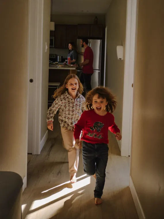 Lifestyle property shoot: lifestyle, kids running down the hall