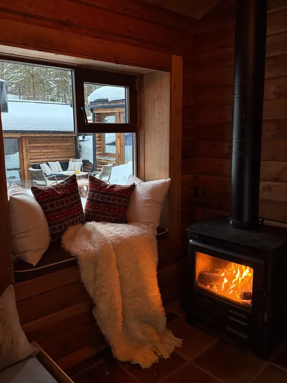 Real estate photography: airbnb, reading nook by the fire