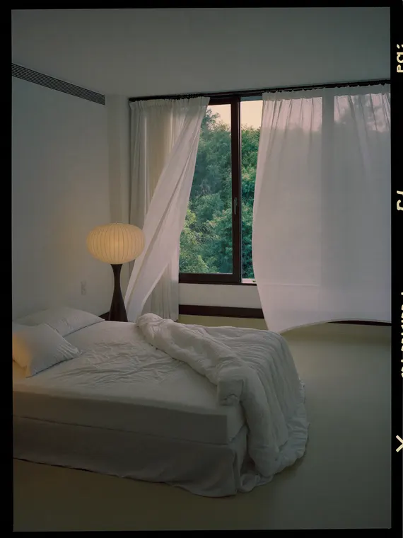 Real estate photography: bedroom, minimal white sanctuary