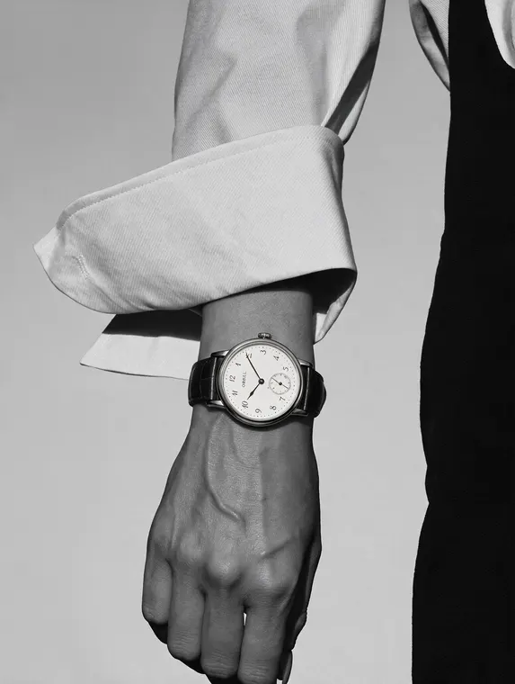 Watch model shoot: Orrel Meridian, white cuff, black and white